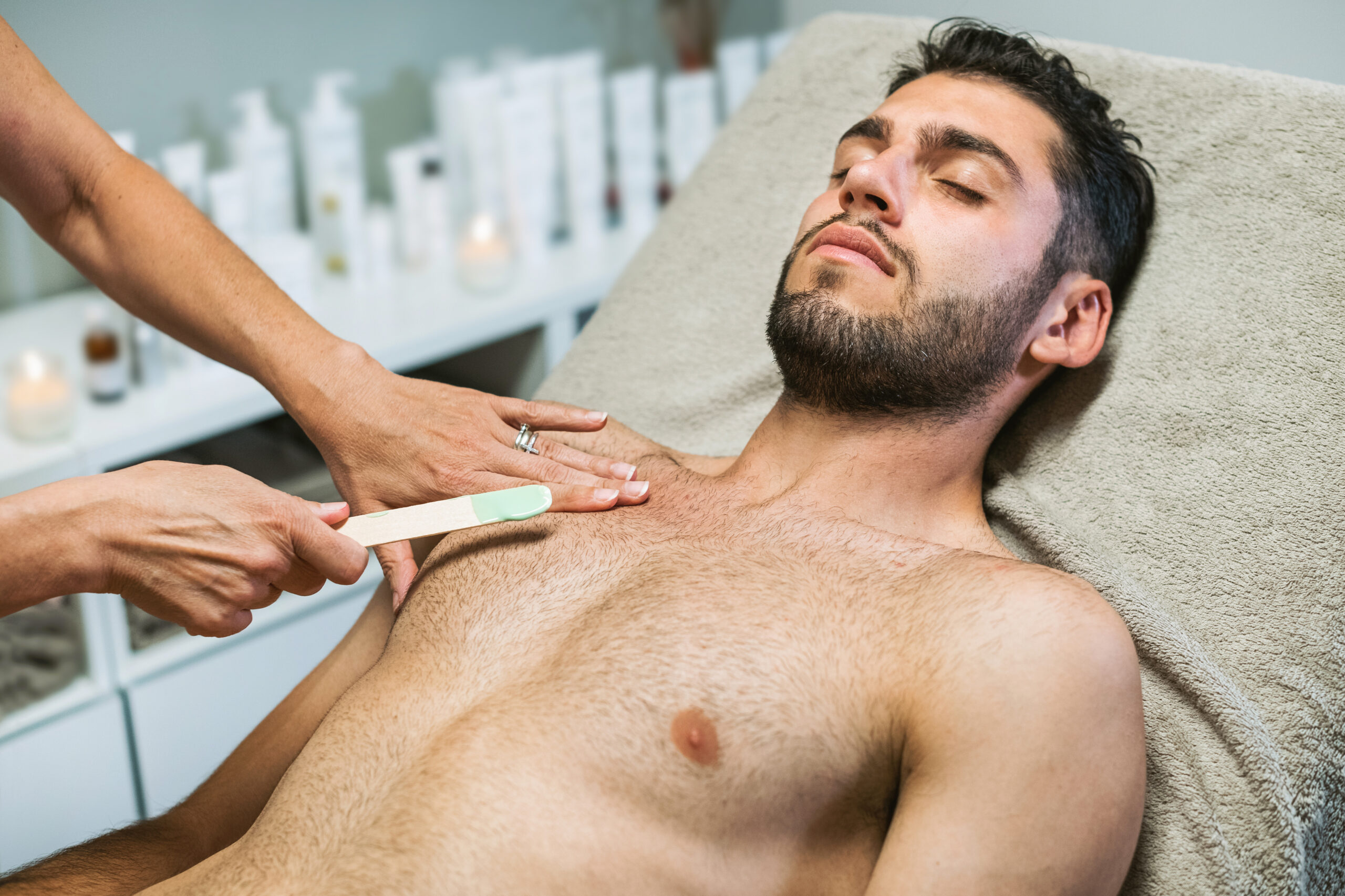 Wax Hair Removal on male patent chest client